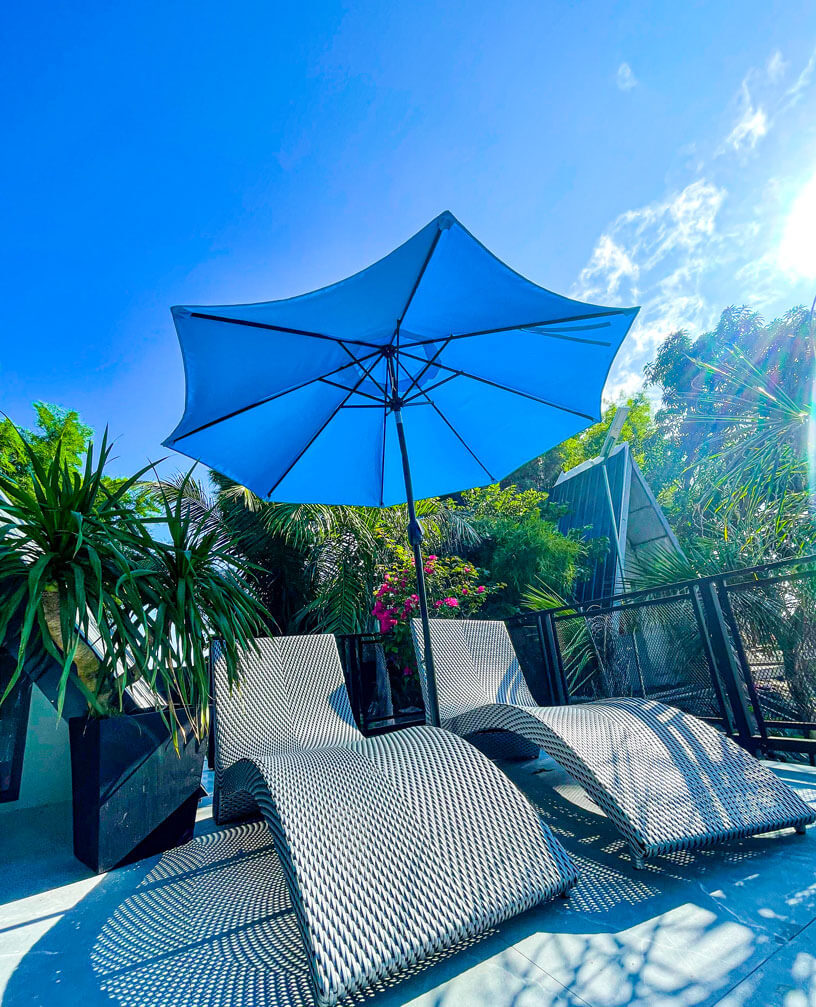 Poolside loungers at Oliva's Resort